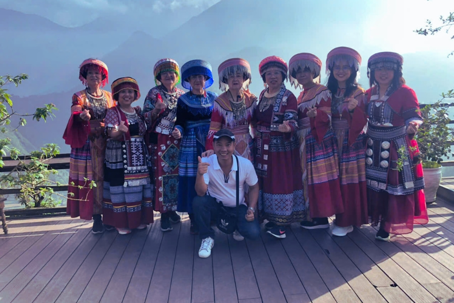 Travelers experience Sapa ethnic culture in traditional costumes with Auasia Travel